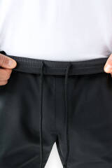 CLINIC WASH Pantalon Homme - Bas de jambe droit Taille courte noir/jaune