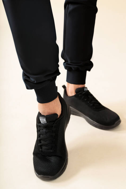 KAERE Pantalon Homme - ourlets côtelés Taille courte et sans poches cargo noir